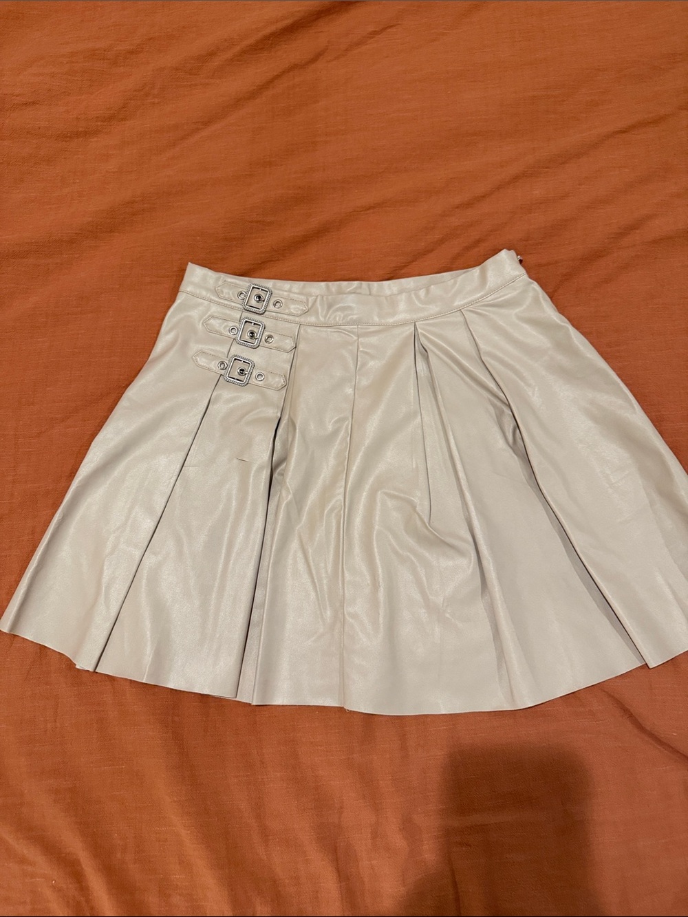 Pleated Vegan Leather Mini Skirt in Light Beige